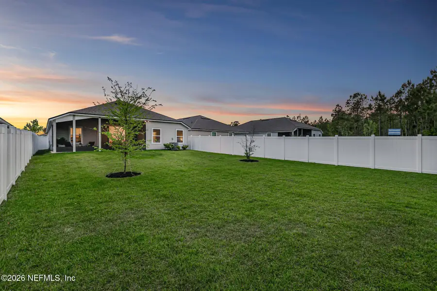 Exterior details and patio area of a home in Cross Creek, Green Cove Springs (Image 27).