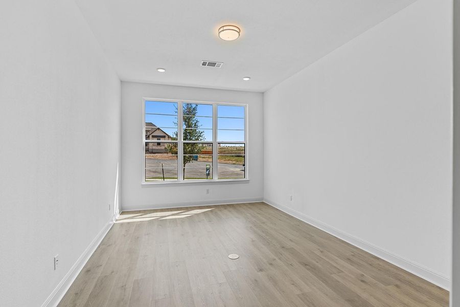 Spacious, unfurnished interior of a new home in Lariat - 80', Liberty Hill (Image 17). Spacious, unfurnished interior of a new home in Lariat - 80', Liberty Hill (Image 17).