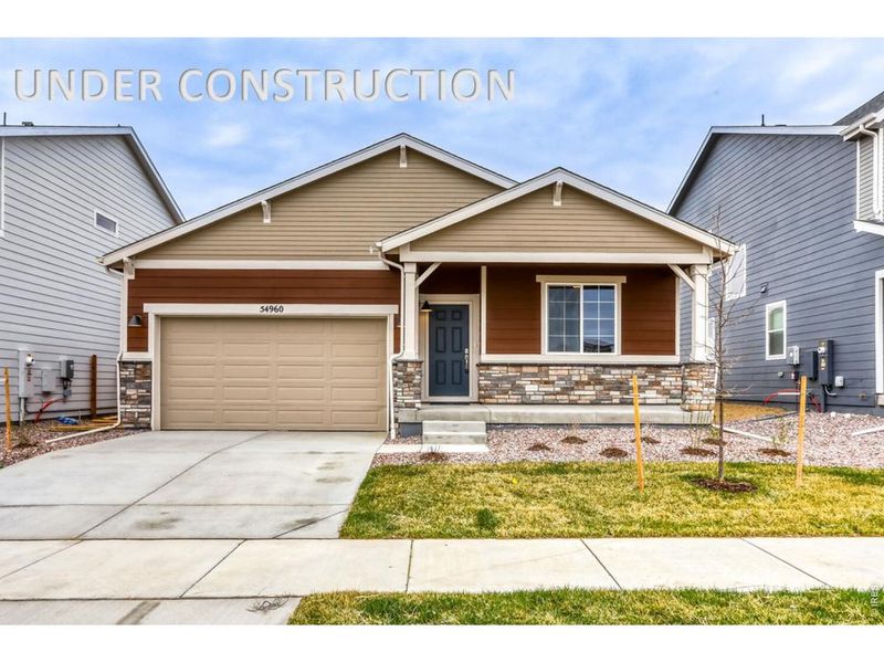 Front exterior of a new home in Farmstead, Berthoud, CO, highlighting curb appeal (Image 21). Front exterior of a new home in Farmstead, Berthoud, CO, highlighting curb appeal (Image 21).