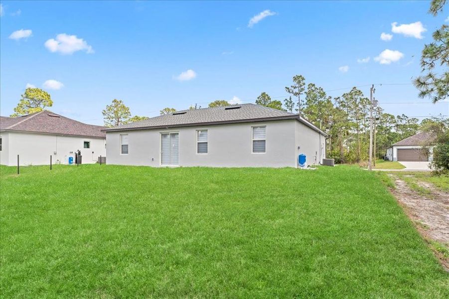 Exterior details and patio area of a home in , Lehigh Acres (Image 3).