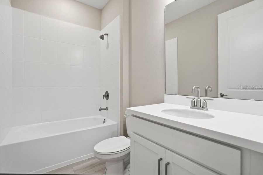 Furnished interior view inside a new home in Coasterra Community Group Page, Palmetto (Image 7).