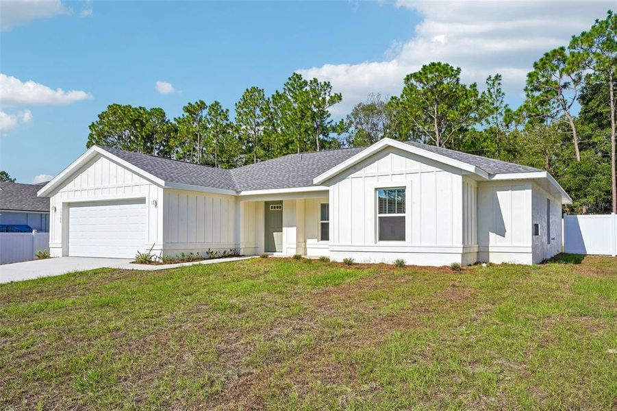 Front exterior of a new home in , Ocala, FL, highlighting curb appeal (Image 20). Front exterior of a new home in , Ocala, FL, highlighting curb appeal (Image 20).