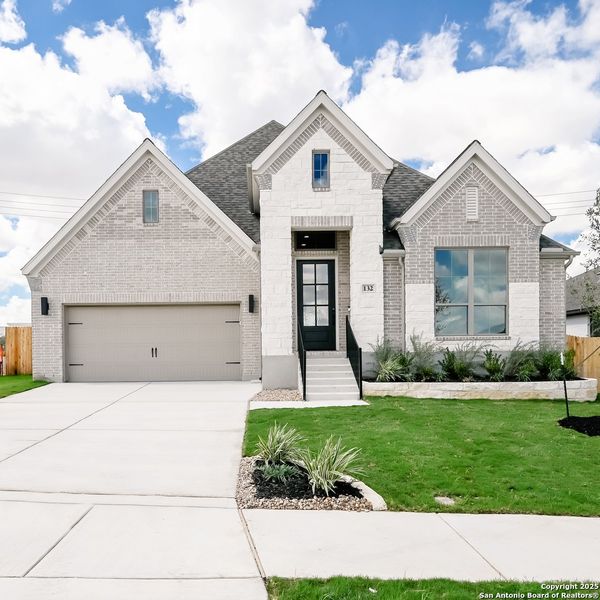 Front exterior of a new home in Cibolo Valley Heights 65', Cibolo, TX, highlighting curb appeal (Image 27).