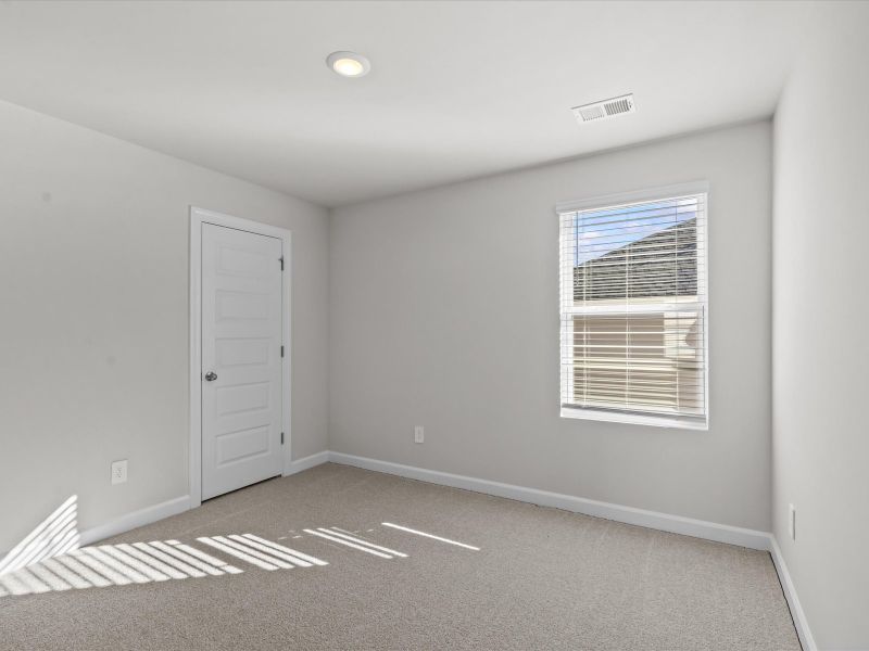 Spacious, unfurnished interior of a new home in The Farm at Wells Creek - Heritage Collection, Gray Court (Image 16).