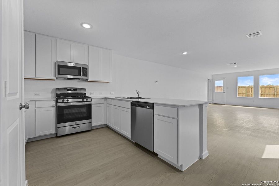 Furnished interior view inside a new home in , New Braunfels (Image 7).