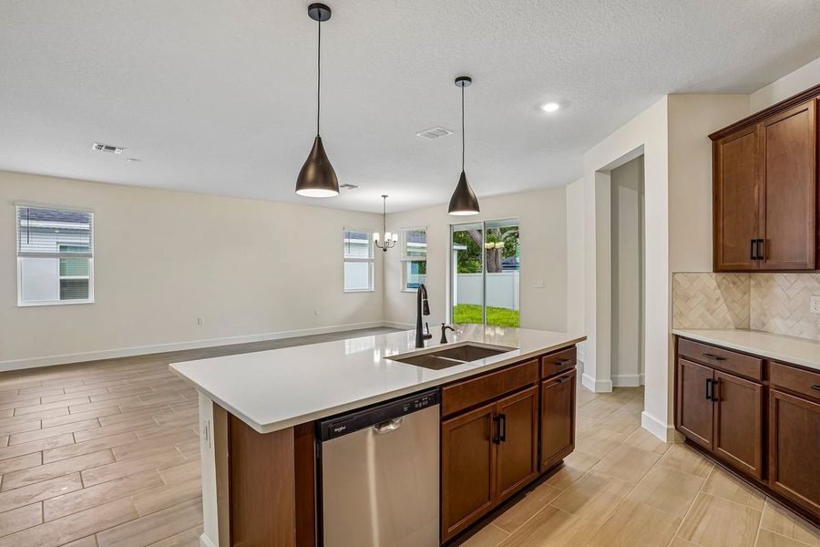 Furnished interior view inside a new home in Oasis Reserve, Orlando (Image 6).