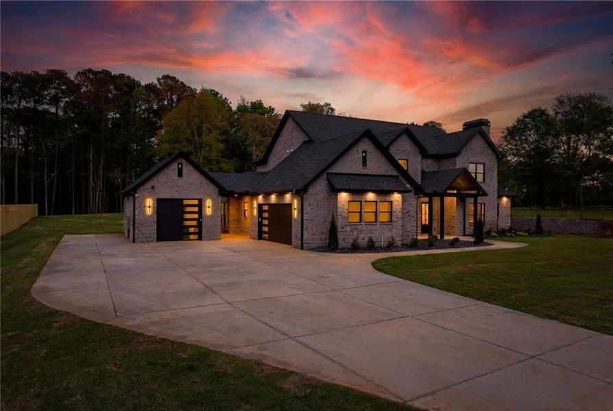 Front exterior of a new home in , Monroe, GA, highlighting curb appeal (Image 1). Front exterior of a new home in , Monroe, GA, highlighting curb appeal (Image 1).