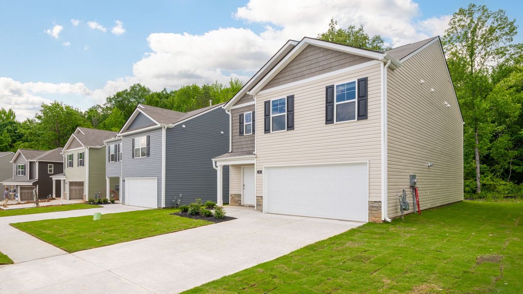 Front exterior of a new home in Hawk's Ridge, Rossville, GA, highlighting curb appeal (Image 18).