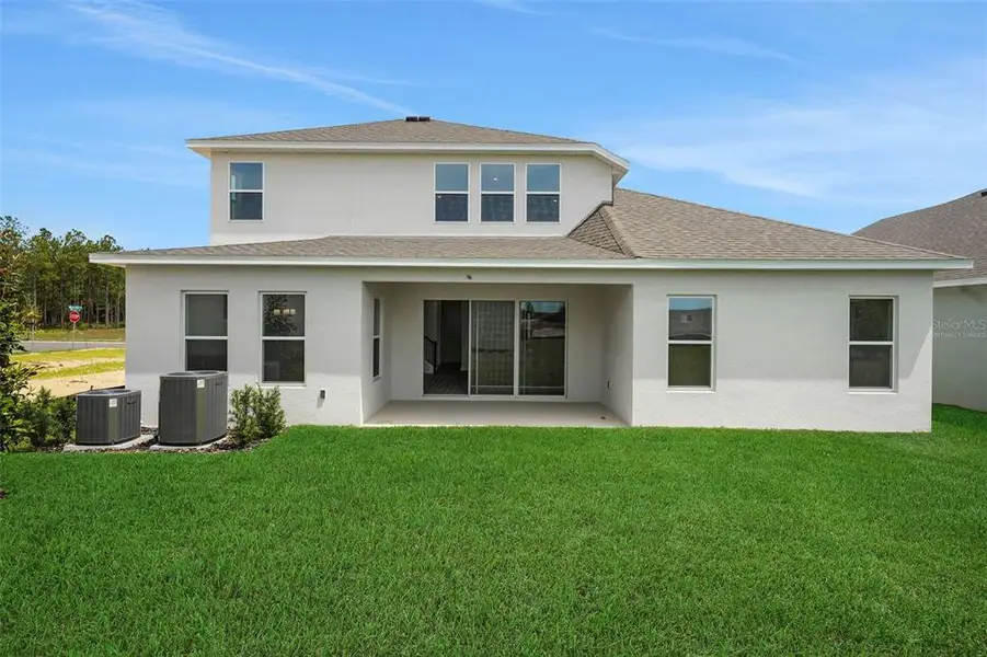 Exterior details and patio area of a home in Avalon Woods, Winter Garden (Image 31).