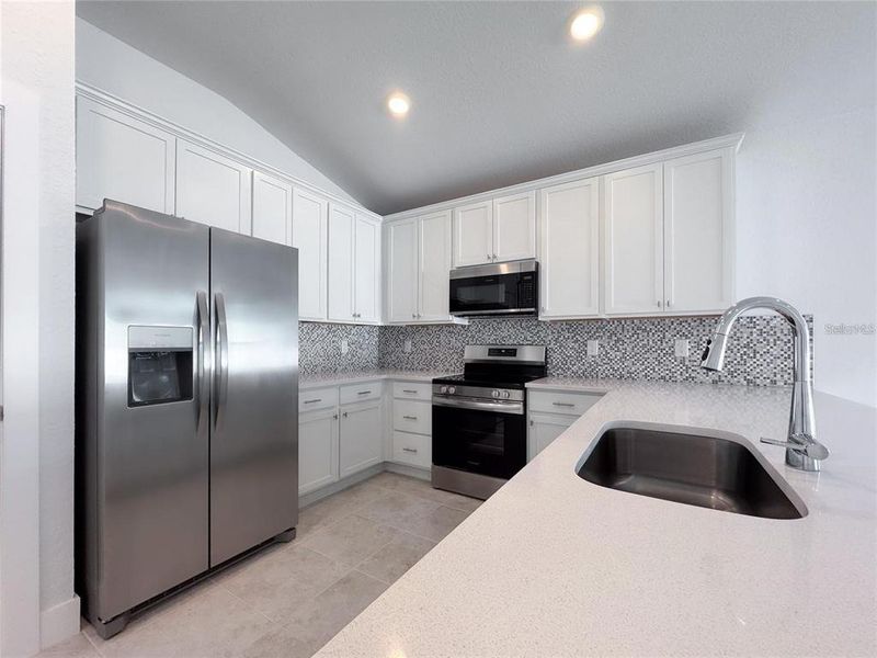 Furnished interior view inside a new home in , Port Charlotte (Image 14).
