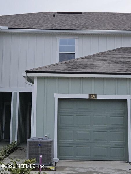 Front exterior of a new home in Liberty Cove, Yulee, FL, highlighting curb appeal (Image 27).