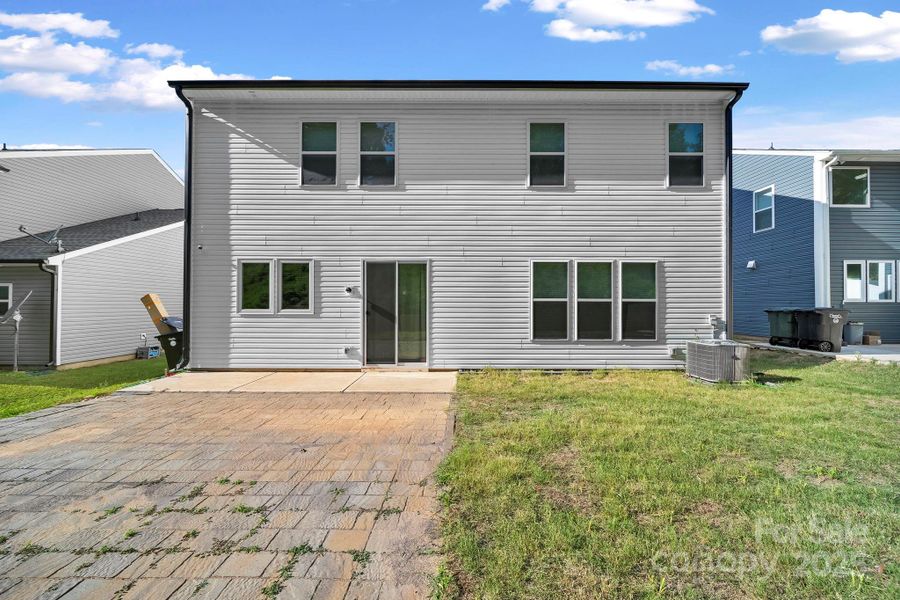 Front exterior of a new home in , Concord, NC, highlighting curb appeal (Image 2).