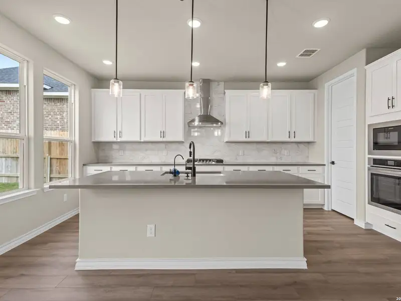 Furnished interior view inside a new home in The Reserve at Potranco Oaks, Castroville (Image 9).