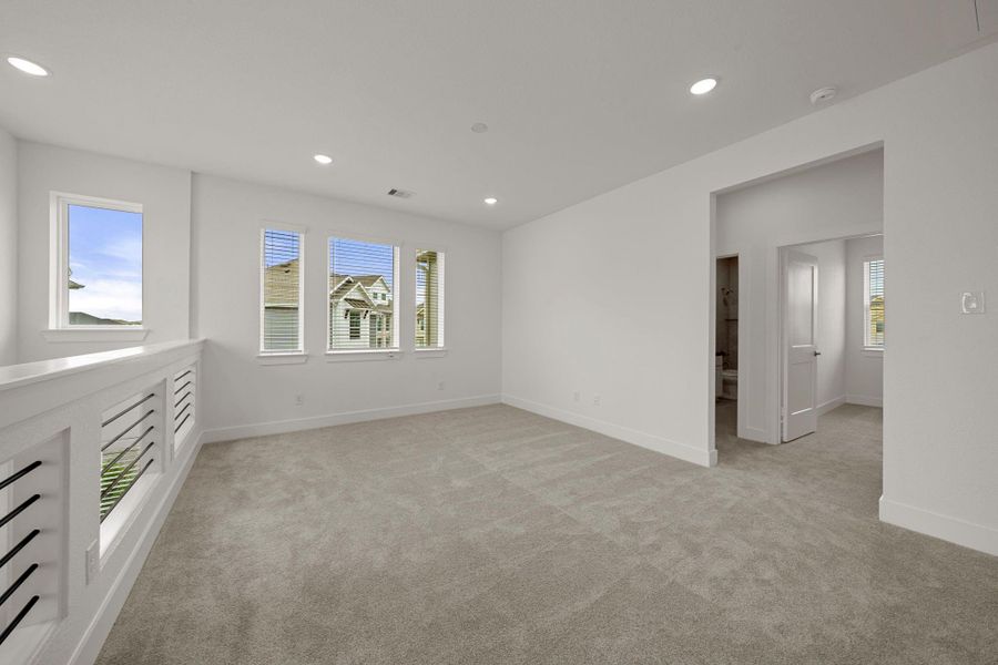 Spacious, unfurnished interior of a new home in Bridgeland, Cypress (Image 11).