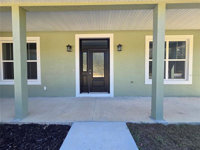 Exterior details and patio area of a home in , Citrus Springs (Image 31).