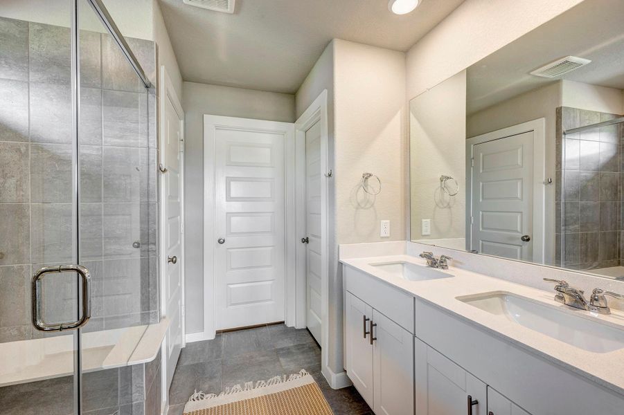 The primary ensuite bath features a large walk-in shower, double sinks and a great walk-in closet. The primary ensuite bath features a large walk-in shower, double sinks and a great walk-in closet.