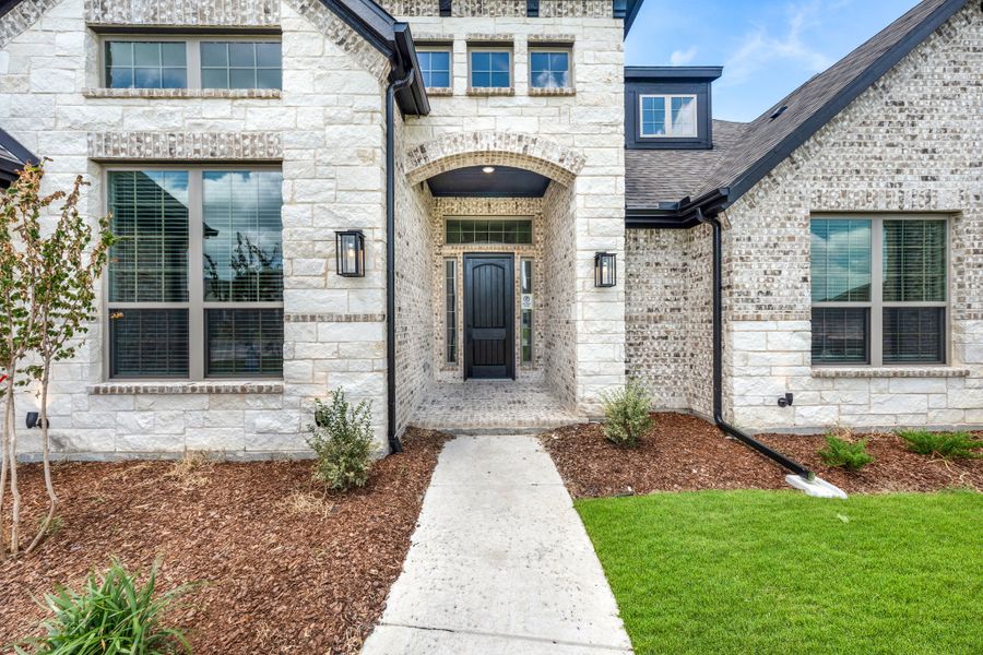 Exterior details and patio area of a home in Heritage, McLendon-Chisholm (Image 3).