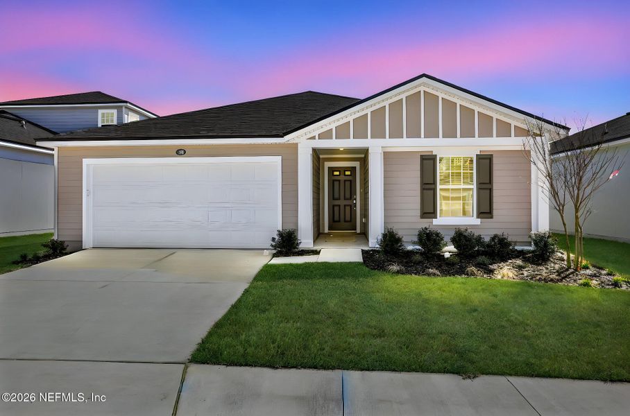Front exterior of a new home in Bellbrooke, Jacksonville, FL, highlighting curb appeal (Image 18).