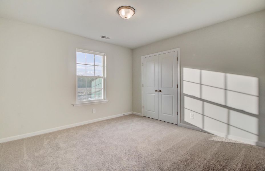 Spacious, unfurnished interior of a new home in Limehouse Farms: Arbor Collection, Summerville (Image 12).