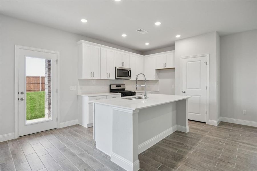 Furnished interior view inside a new home in Santorini, Seagoville (Image 5).