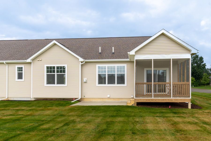 Representative exterior photo of a completed home built from the The Esher Paired Ranch Condominium by Norfolk Homes in Mystic Ridge, Whitmore Lake, MI (Image 28).