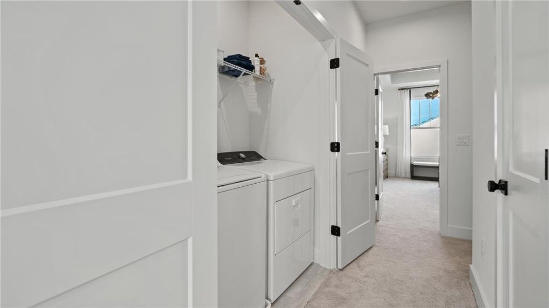 Furnished interior view inside a new home in Parkview at Hamlin, Winter Garden (Image 16).