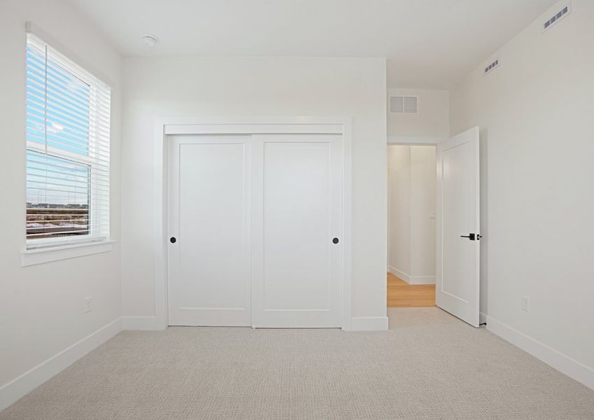 The secondary bedrooms are a great space for children's bedrooms or guest rooms.