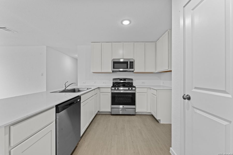 Furnished interior view inside a new home in , New Braunfels (Image 6).