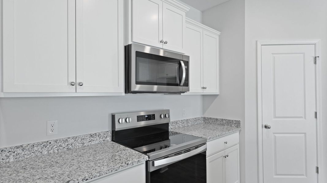 Representative furnished interior of a home built from the ARCHER-EXP by D.R. Horton in Lakeview at Kitfield, Moncks Corner (Image 10).
