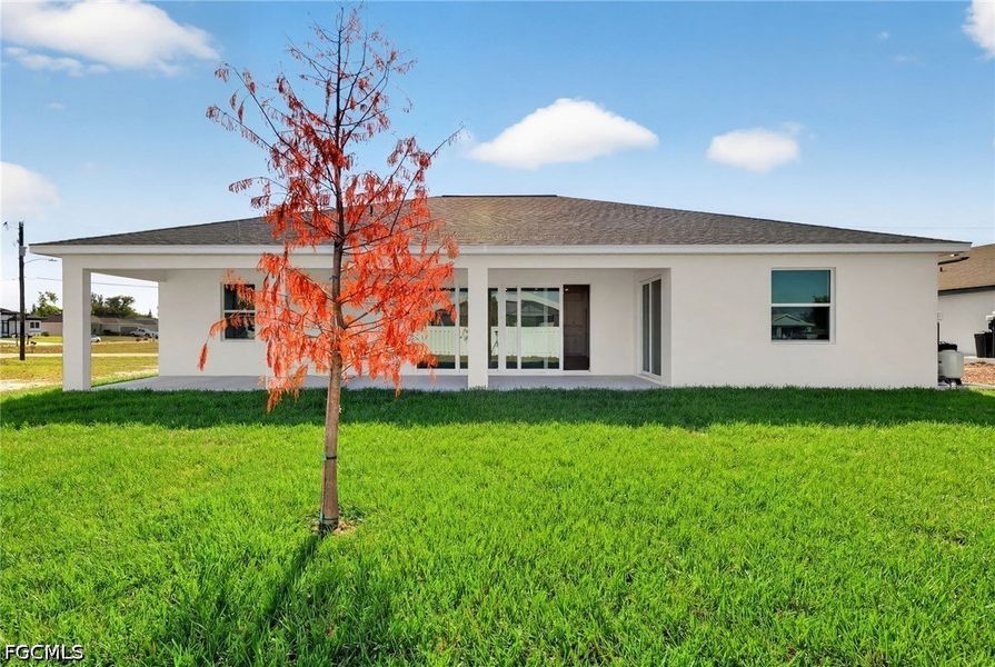 Exterior details and patio area of a home in Cape Coral, Cape Coral (Image 3).