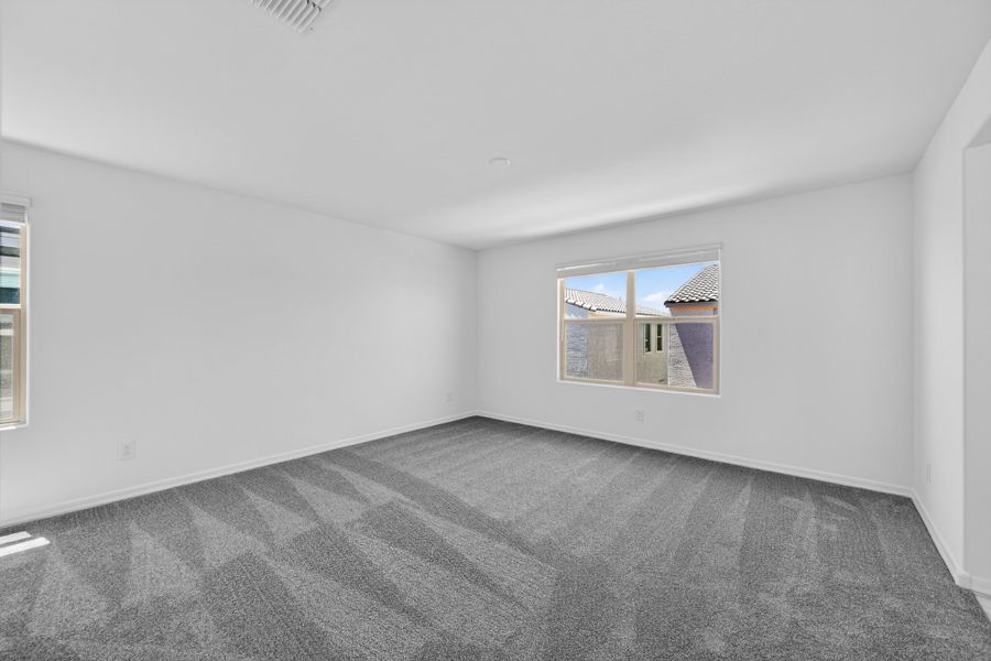 Spacious, unfurnished interior of a new home in Artisan at Asante, Surprise (Image 20).