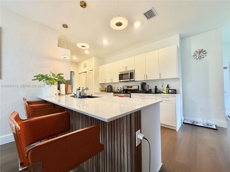 Furnished interior view inside a new home in , Dania Beach (Image 15).