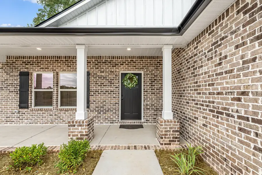 Exterior details and patio area of a home in Barton's Bend, Crestview (Image 4). Exterior details and patio area of a home in Barton's Bend, Crestview (Image 4).