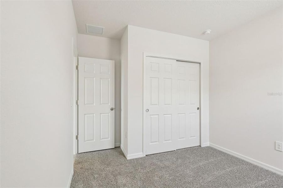 Spacious, unfurnished interior of a new home in Bradbury Creek - Signature Series, Haines City (Image 22).