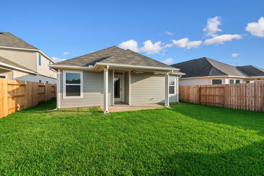 Exterior details and patio area of a home in Lone Star Landing, Montgomery (Image 20).