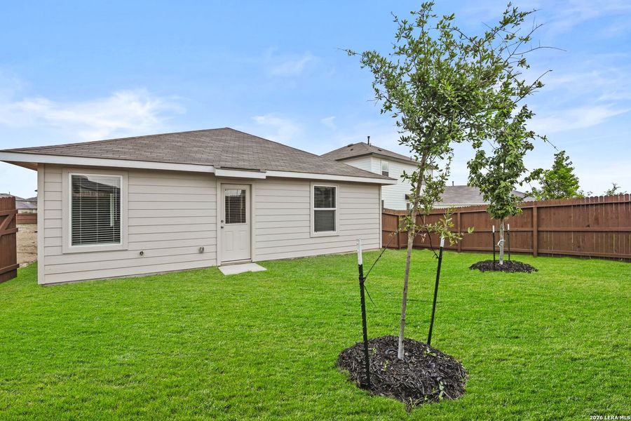 Exterior details and patio area of a home in Avenida, Converse (Image 2).