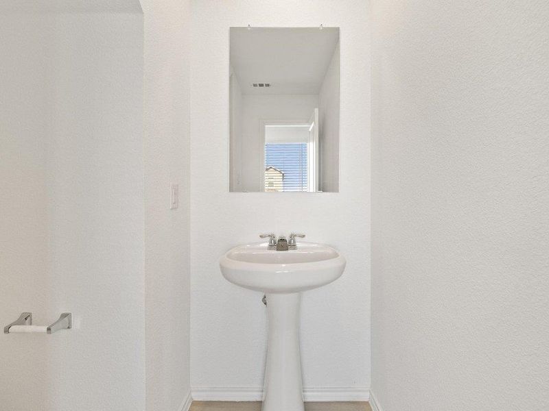 Bathroom featuring baseboards