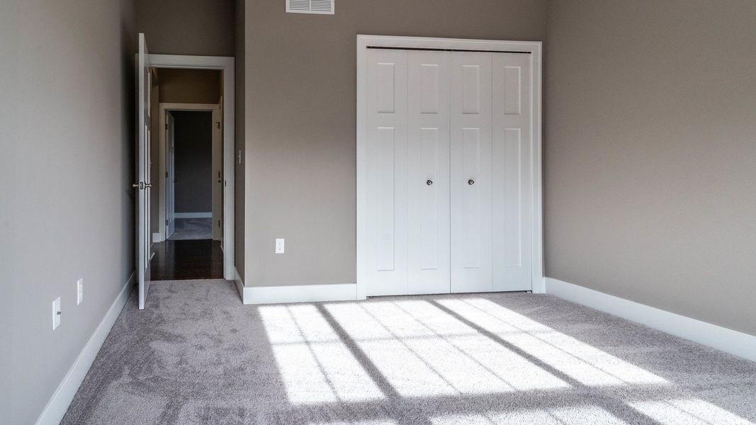 Representative unfurnished interior of a home built from the The Boulder Side Entry by Norfolk Homes in The Grande Estates, Jackson (Image 28).