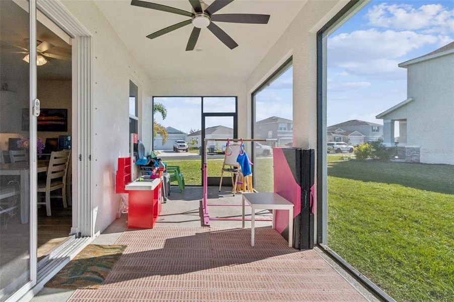 Exterior details and patio area of a home in Bella Lago, Parrish (Image 4).