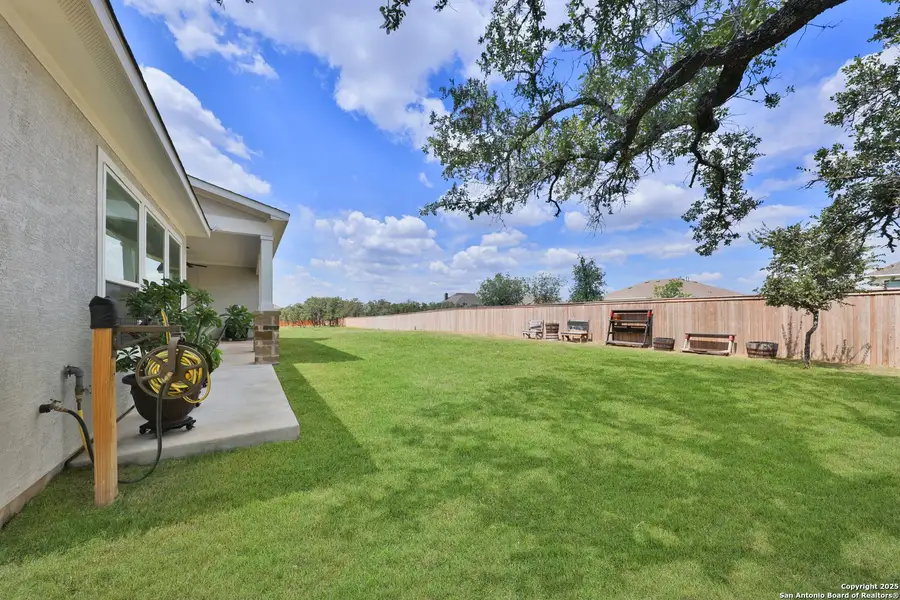 Front exterior of a new home in Megans Landing – Half-Acre Homesites, Castroville, TX, highlighting curb appeal (Image 1). Front exterior of a new home in Megans Landing – Half-Acre Homesites, Castroville, TX, highlighting curb appeal (Image 1).