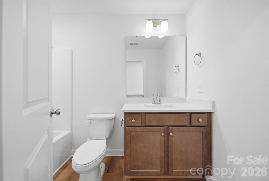Furnished interior view inside a new home in , Hickory (Image 9).