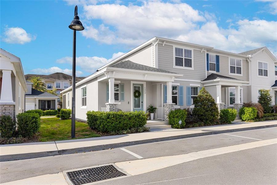 Front exterior of a new home in Hickory Grove, Winter Springs, FL, highlighting curb appeal (Image 24).