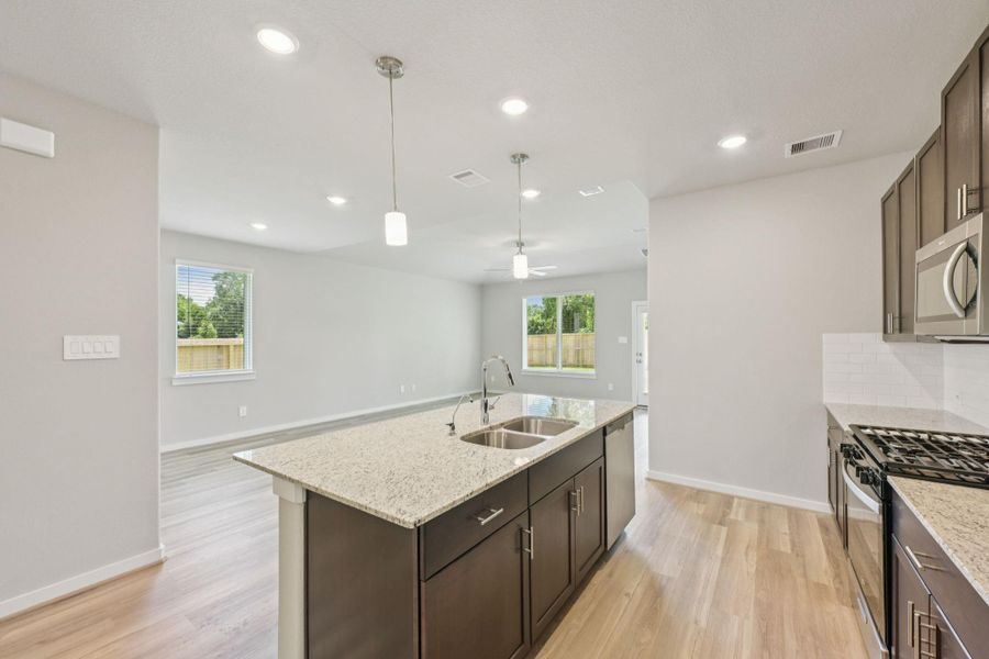 Furnished interior view inside a new home in Sundance Cove - Premier Series, Crosby (Image 4).