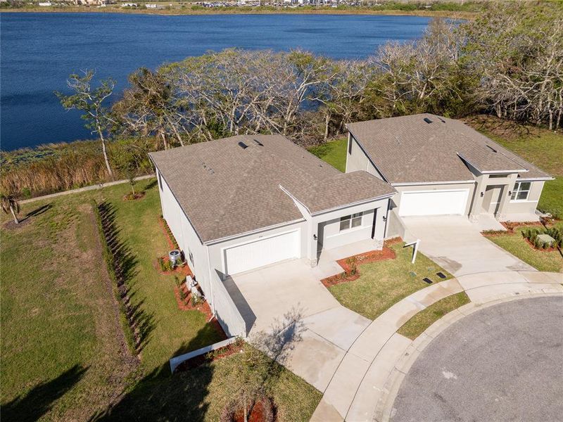 Front exterior of a new home in , Haines City, FL, highlighting curb appeal (Image 1). Front exterior of a new home in , Haines City, FL, highlighting curb appeal (Image 1).