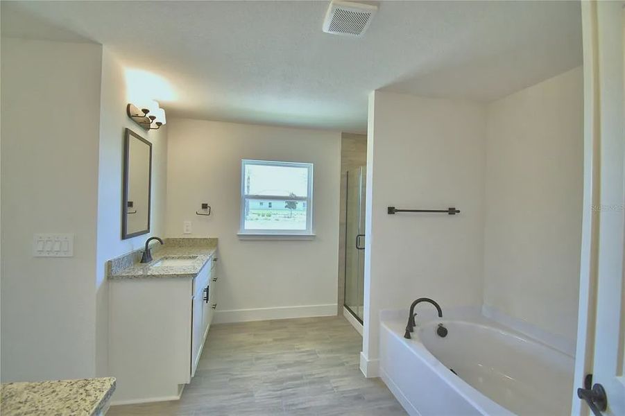 Furnished interior view inside a new home in Lake Juliana Estates, Auburndale (Image 13).