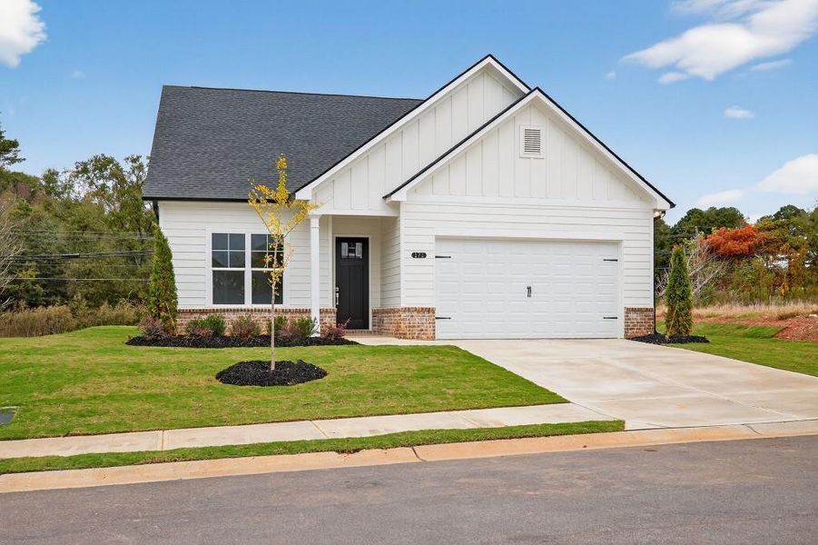 Front exterior of a new home in Red Bird Manor, Jefferson, GA, highlighting curb appeal (Image 22). Front exterior of a new home in Red Bird Manor, Jefferson, GA, highlighting curb appeal (Image 22).