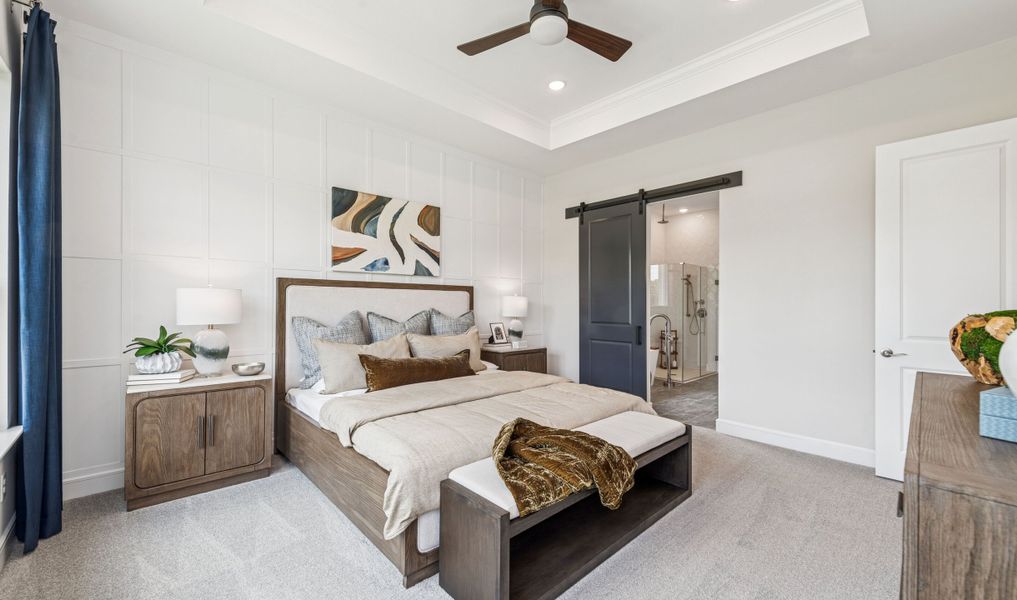 Primary suite with decorated feature wall