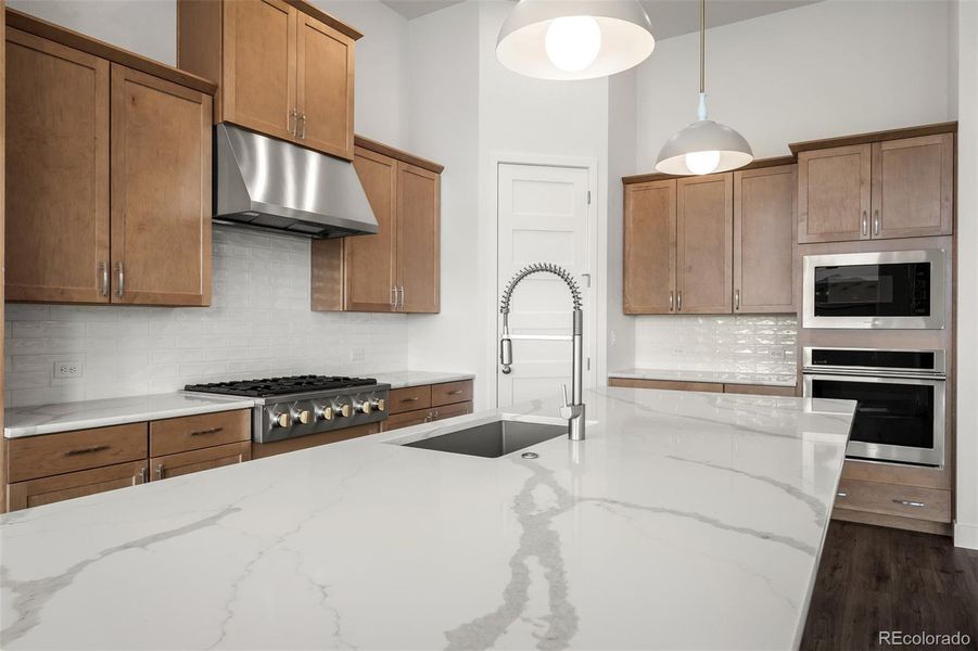 Furnished interior view inside a new home in Cloverleaf - Pinnacle Collection, Monument (Image 6).