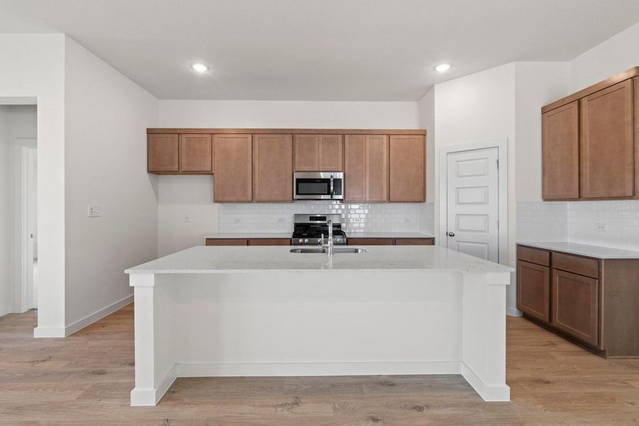 Furnished interior view inside a new home in Prairie Winds, Hutto (Image 6).