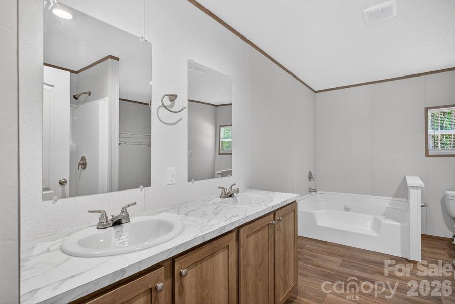 Primary Bath with dual sinks and garden tub!